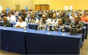 The delegates listening to presenter 02